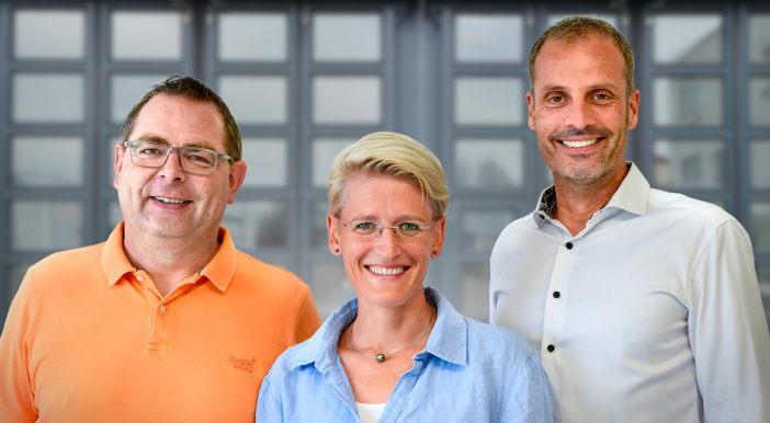 Die heutige Geschäftsführung: Mark Wenner, Kira Schmidtmann und Christoph Wilmes